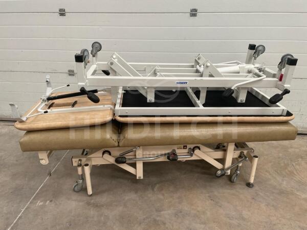 1 x Akron & 1 x Huntleigh Nesbit Evans 2-Section Hydraulic Patient Couches