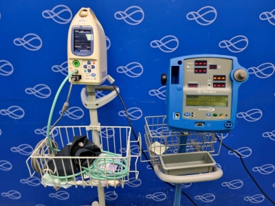 GE Dynamap PRO 400V2 Vital Signs Monitor and Fukuda Denshi PetiTelemo Vital Signs Monitor on Rollstands