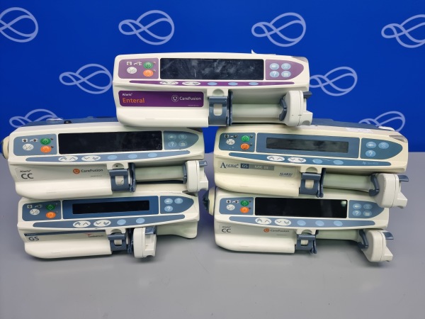 2 x Alaris CC Syringe Pumps, 2 x Alaris GS Syringe Pumps (1 x Damaged), and 1 x Alaris Enteral Syringe Pump