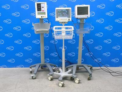 Eden iM50 Patient Monitor, Datascope Accutorr Plus Vital Signs Monitor and Datascope Trio Patient Monitor All on Rollstands