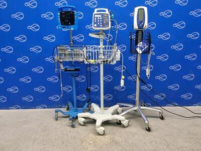 GE Procare Dinamap Patient Monitor, Welch Allyn Spot Vital Signs Monitor and CSI Criticare Comfort Cuff 506 NT3 Series Patient Monitor, All on Rollstands
