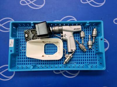 Stryker System 7 7205000000 Dual Triggery Rotary Handpiece with 5 x Attachments, 1 x Battery Transfer Shirld and 1 x Battery Housing
