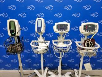 1 x Welch Allyn 53N00 Vital Signs Monitor, 1 x Welch Allyn 53N0P Vital Signs Monitor, 1 x Welch Allyn 42N0B Spot Vital Signs Monitor & 1 x Welch Allyn 420 Series Spot Vital Signs Monitor on 4 x Rollstand