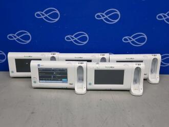 6 x Welch Allyn Connex Spot Monitor - One on Rollstand with Welch Allyn 7000-APM Accessory Power Management Unit