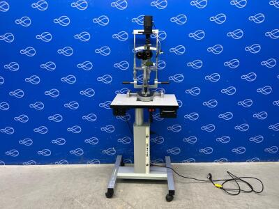 Takagi 304-JSM Slit lamp on Table