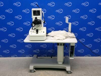Kowa Nonmyd Wx 3D Retinal Camera on Table