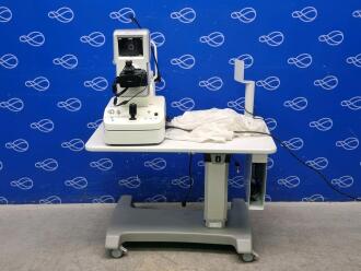 Kowa Nonmyd Wx 3D Retinal Camera on Table
