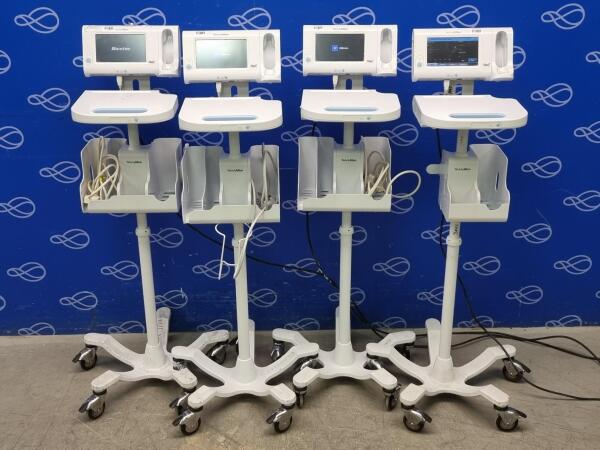 4 x Welch Allyn 75ME Connex Monitor and Welch Allyn 7000-APM Accessory Power Management Unit on Rollstand