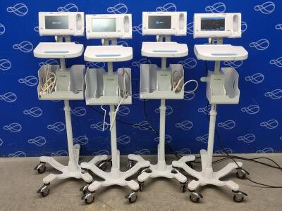 4 x Welch Allyn 75ME Connex Monitor and Welch Allyn 7000-APM Accessory Power Management Unit on Rollstand