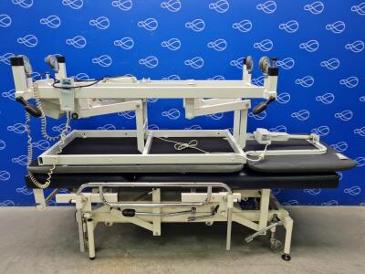 1 x Huntleigh Nesbit Evans and 1 x Huntleigh Akron A2223/8/2HS Electric Treatment Couch