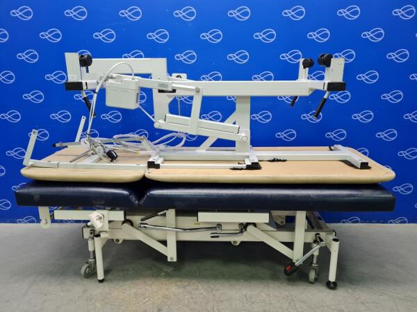 1 x Huntleigh Nesbit Evans 43.100 and 1 x Plinth 2000 2-Section Electric Examination Couch