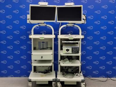 2 x Olympus Stack Trolleys with 2 x Olympus OEV262 Display Monitors and 1 x Olympus Evis Lucera Elite CLV-290SL Light Source